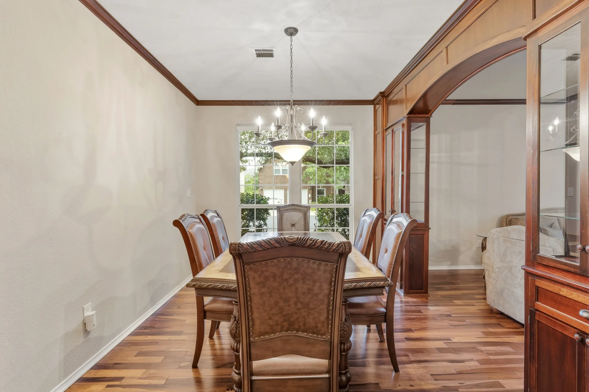 Formal dining room with chandelier and built-ins