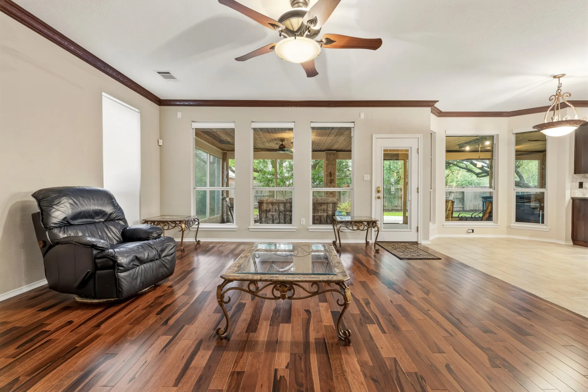 Family room opening to screened patio and backyard